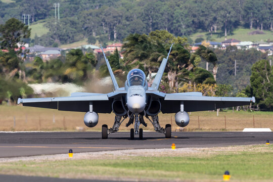 Albion Park, Australia - May 4, 2014: Royal Australian Air Force (RAAF) McDonnell Douglas F/A-18B Hornet jet aircraft A21-112 at Illawarra Regional Airport, Albion Park.