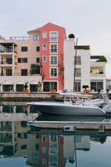 boats in the marina. modern seaport street view architecture