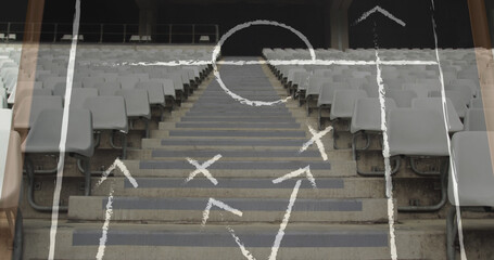 Fototapeta premium Image of drawing of game plan over empty stadium