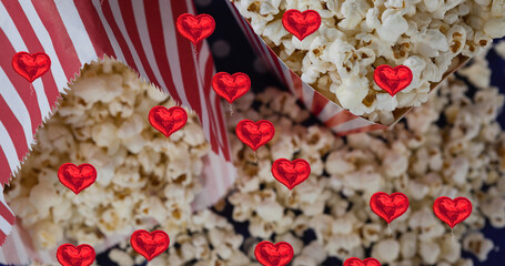 Image of heart icons over boxes of popcorn