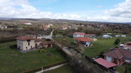 Fototapeta na wymiar rural town in the countryside in burgos, spain (aerial cinematic footage)