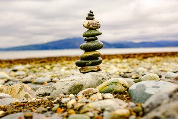 Pebble balancing on beach