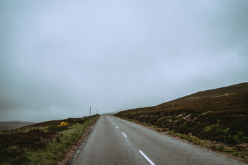 Foggy road through the mountains