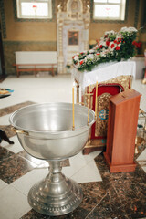 bowl for the baptism of a child in the church. rite of Orthodox baptism