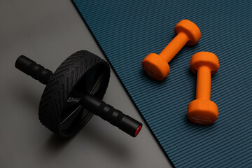 dumbbell and wheel slider