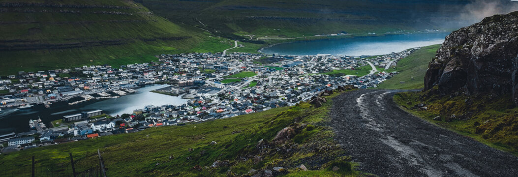 Beautiful view of the City of Klaksvik in the Faroe Islands with its colorful houses and amazing canal and view to the Kunoy Park.