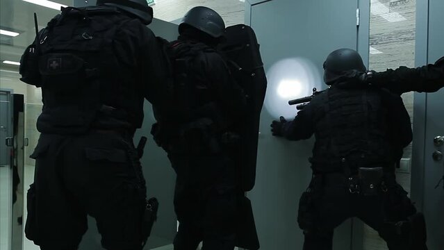Special forces in black uniforms.