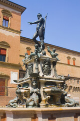 Fototapeta na wymiar Fountain of Neptune at Piazza del Nettuno in Bologna, Italy