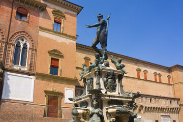Fototapeta na wymiar Fountain of Neptune at Piazza del Nettuno in Bologna, Italy 