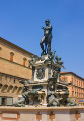 Fototapeta na wymiar Fountain of Neptune at Piazza del Nettuno in Bologna, Italy