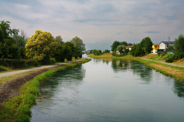 Fototapeta na wymiar Muzza canal at Quatiano, in Lodi province