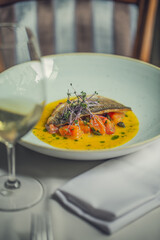 Sea bass Fish, Lavrak on White Plate, Tasting, Restaurant food