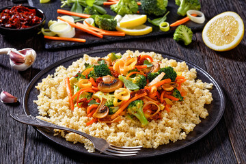 quinoa with fried veggies, mushrooms on plate