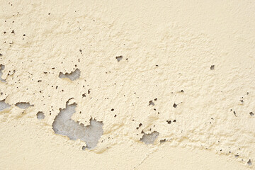 cement background with peeling paint