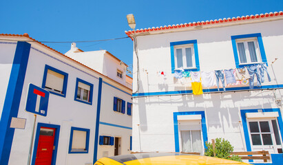 Fototapeta premium colorful houses and streets of sunny cozy Ericeira