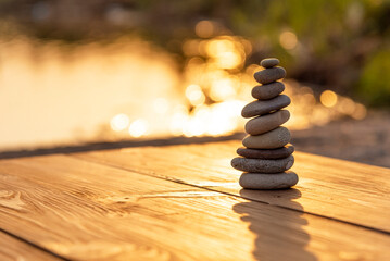 Balance Stones stacked to pyramid in the soft nature.