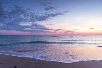 Colorful ocean beach sunrise.