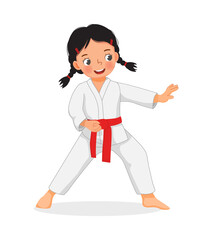 cute little karate kid girl with red belt showing hand defense techniques poses in martial art training practice