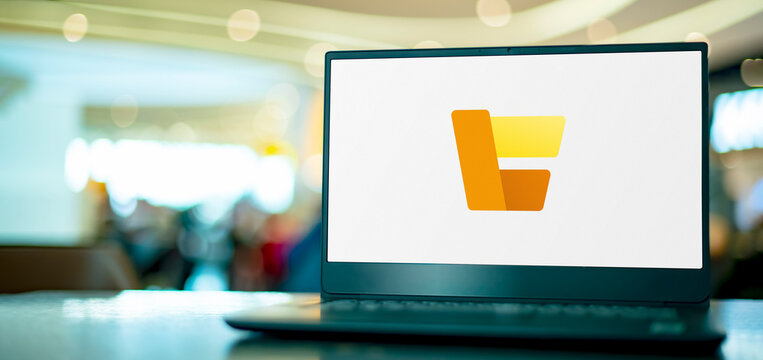 Computer displaying logo of Microsoft Dynamics 365 Commerce