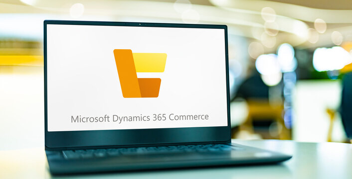 Computer displaying logo of Microsoft Dynamics 365 Commerce