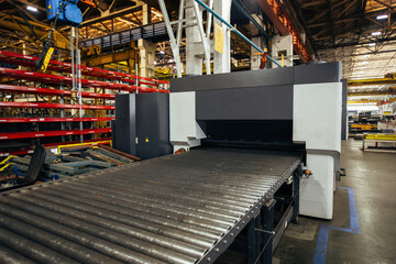 Modern metal sheet forming machine at the metalwork factory