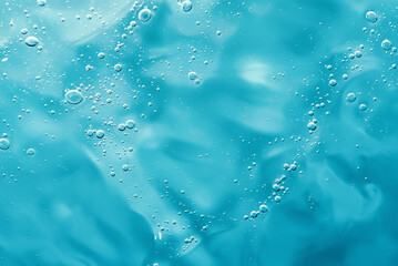 Close up macro Aloe vera gel cosmetic texture blue background with bubbles. Lemongrass gel skincare...