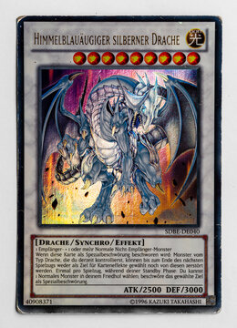 Hamburg, Germany - 12212021: Picture Of The German V1 Ultra Rare Yu Gi Oh Card Azure Eyes Silver Dragon From The Structure Deck Saga Of Blue Eyes White Dragon Series.