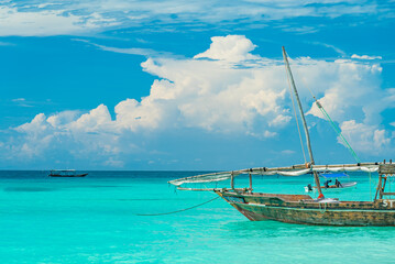 Fishing ship in water of Indian ocean. Zanzibar, Tanzania