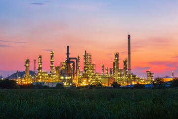 Fototapeta na wymiar Oil​ refinery​ and​ plant and tower column of Petrochemistry industry in oil​ and​ gas​ ​industrial with​ cloud​ red sky