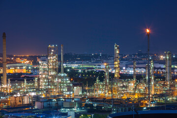 Fototapeta na wymiar Scene of refinery plant and tower column of evening​ sunset Petrochemistry industry