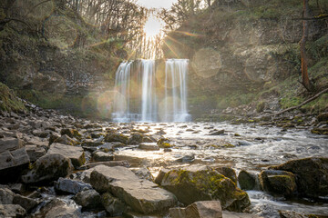 Breacon Beacons Four Falls Waterfall with sunrise light