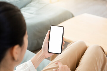 cell phone blank white screen mockup.hand holding texting using mobile on desk at office.background empty space for advertise.work people contact marketing business,technology