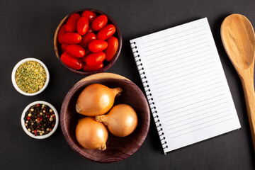 Cookbook with ingredients on the table.Recipe book.