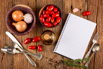 Cookbook with ingredients on the table.Recipe book.