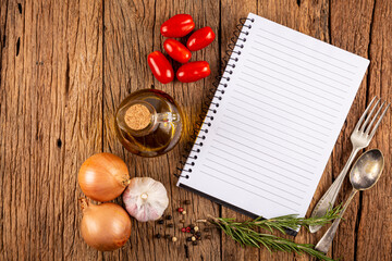 Cookbook with ingredients on the table.Recipe book.