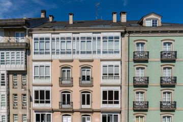 Fototapeta premium downtown Lugo with typical city apartment blocks as seen from the Roman wall and ramparts