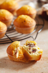 Bunch of homemade muffins with organic cherries