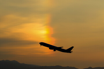 airplane at sunset