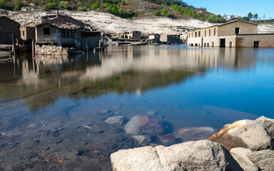 long exposure view of the ghost town of Aceredo in the Alto Lindoso reservoir
