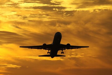 airplane at sunset