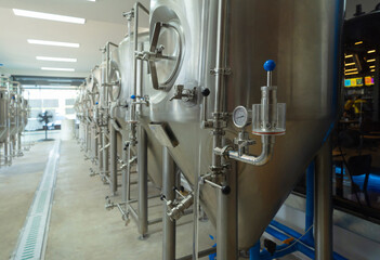 Brewery. Interior of a alcohol or beer drink machine room in kitchen bar of cafe or coffee shop. Business water pipe service. Fermenting.