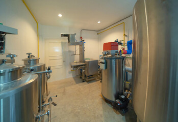 Brewery. Interior of a alcohol or beer drink machine room in kitchen bar of cafe or coffee shop....