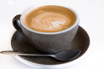 glass of hot latte on a white background