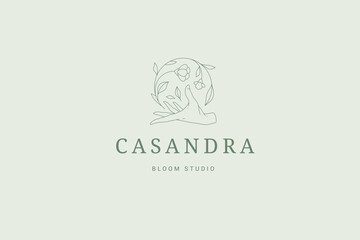 Human hand holding curved natural spring flower steam monochrome linear logo vector