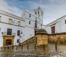 Fototapeta na wymiar A view towards the rear of the cathedral in the city of Cadiz on a spring day
