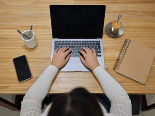 top view of the work area of an entrepreneurial woman