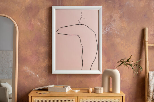 Creative composition vintage living room with rattan chest of drawers, mirror and minimalistic poster. Mock up.