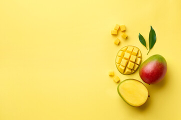 Fresh whole half and sliced mango fruit