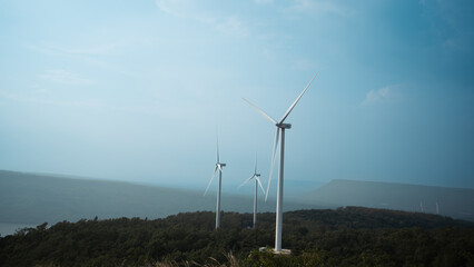 Wind turbine field Generating electricity from renewable energy, wind energy environment friendly.Reduce global warming, sustainability.
Clean Energy Reducing the use fossil fuels in power plant.