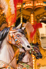 Fototapeta na wymiar Close up - detail of an outdoor carousel in a square in Florence, Italy